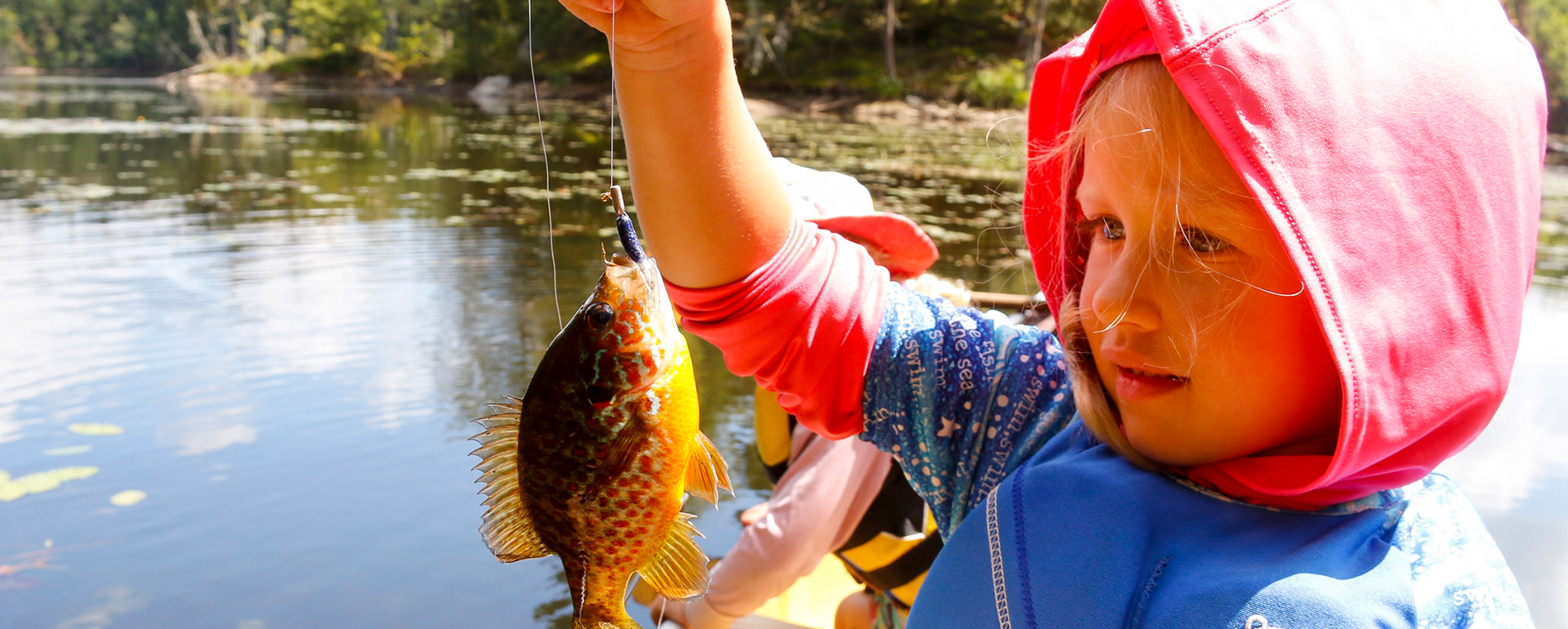 A child catching a fish