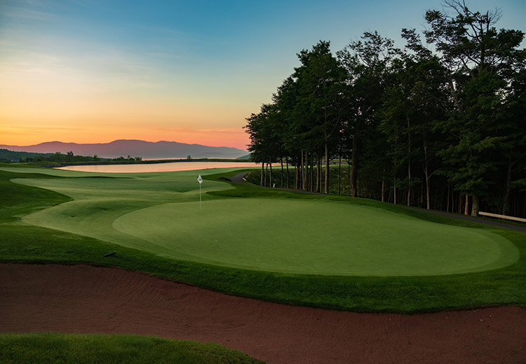 Golf green at sunrise