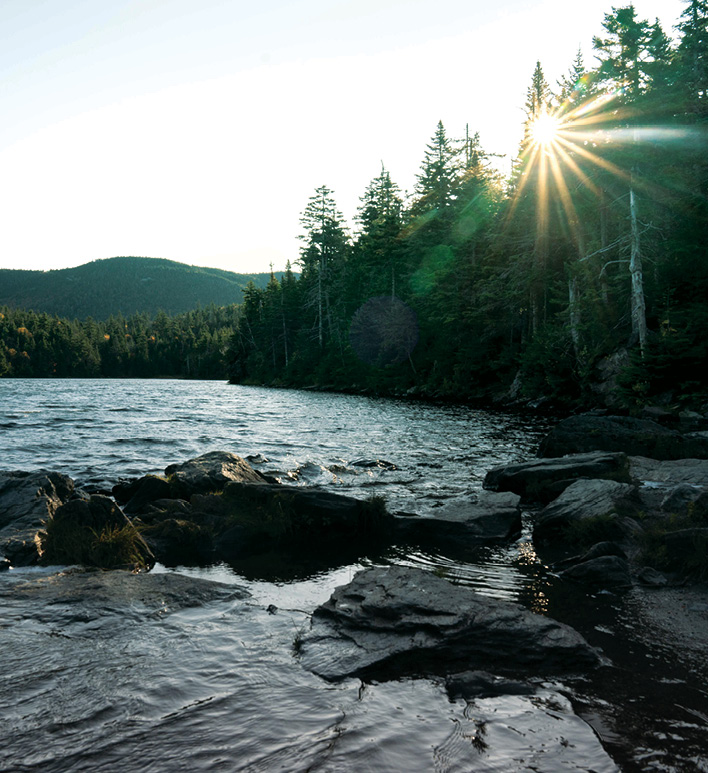 sunbeam over a mountain lake